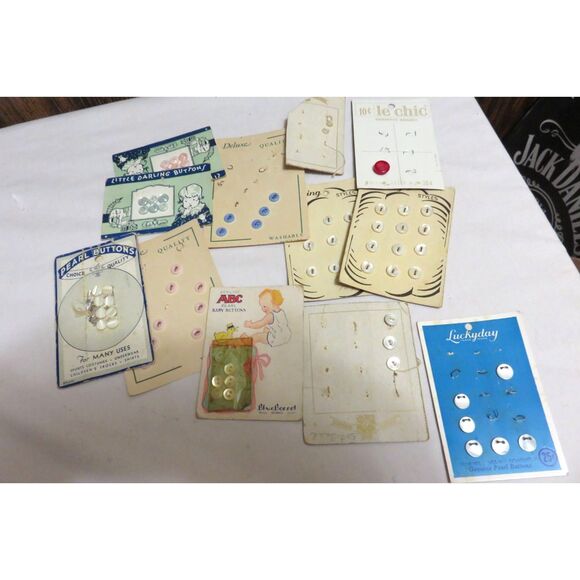 LOT OF 70+ /-  VINTAGE DOLL OR BABY CLOTHES BUTTONS NEW ON THE CARD - Picture 1 of 6